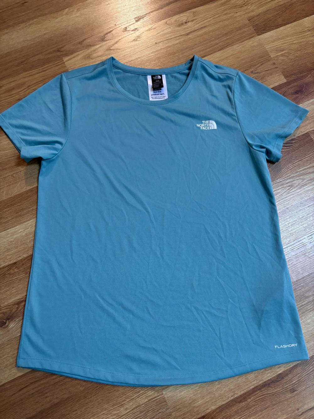 The North Face Aqua Blue Flashdry Athletic Circular Design TShirt Women’s Medium